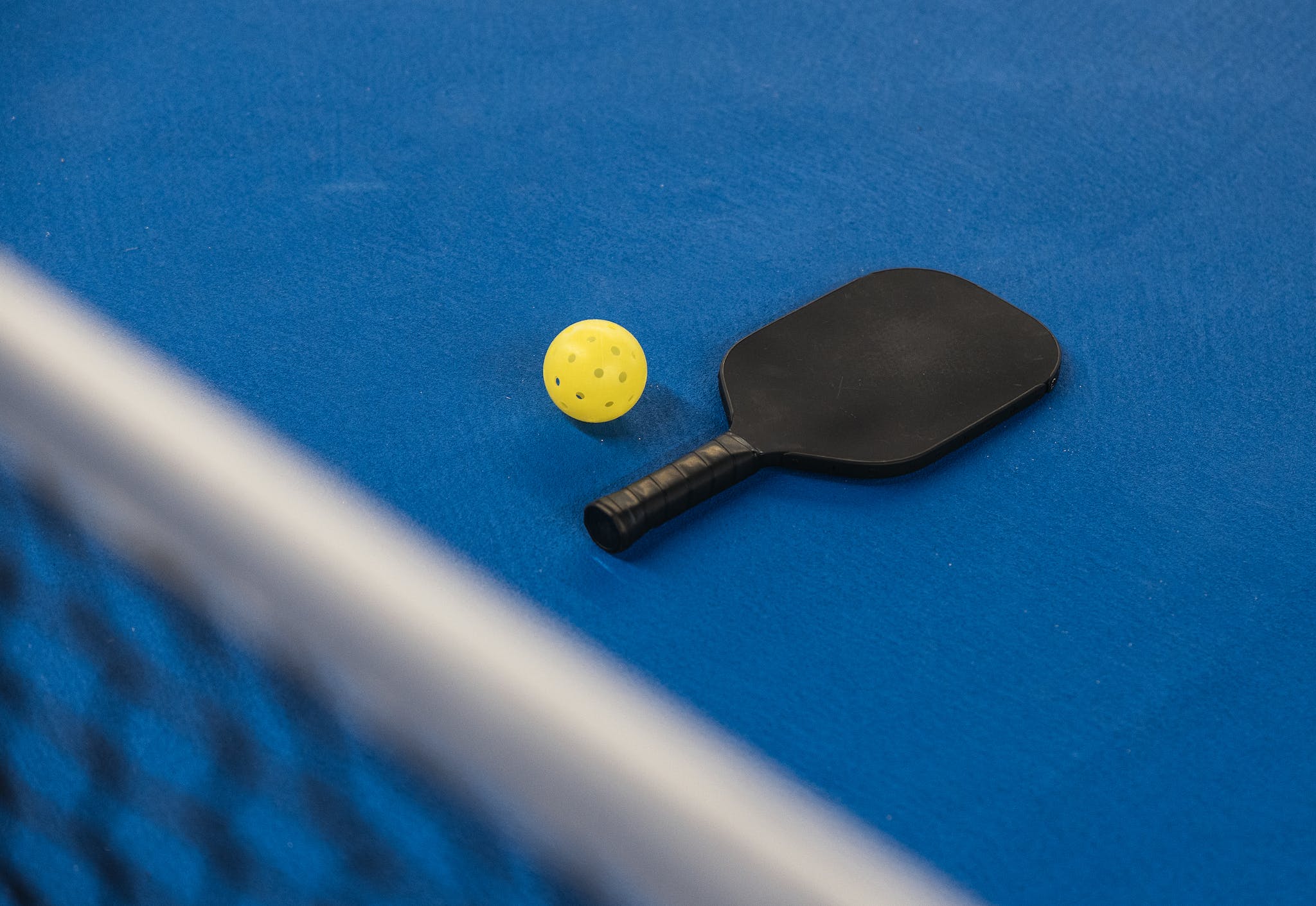 Pickleball Paddle, Ball, Court & Net can you hit a pickleball with your hand